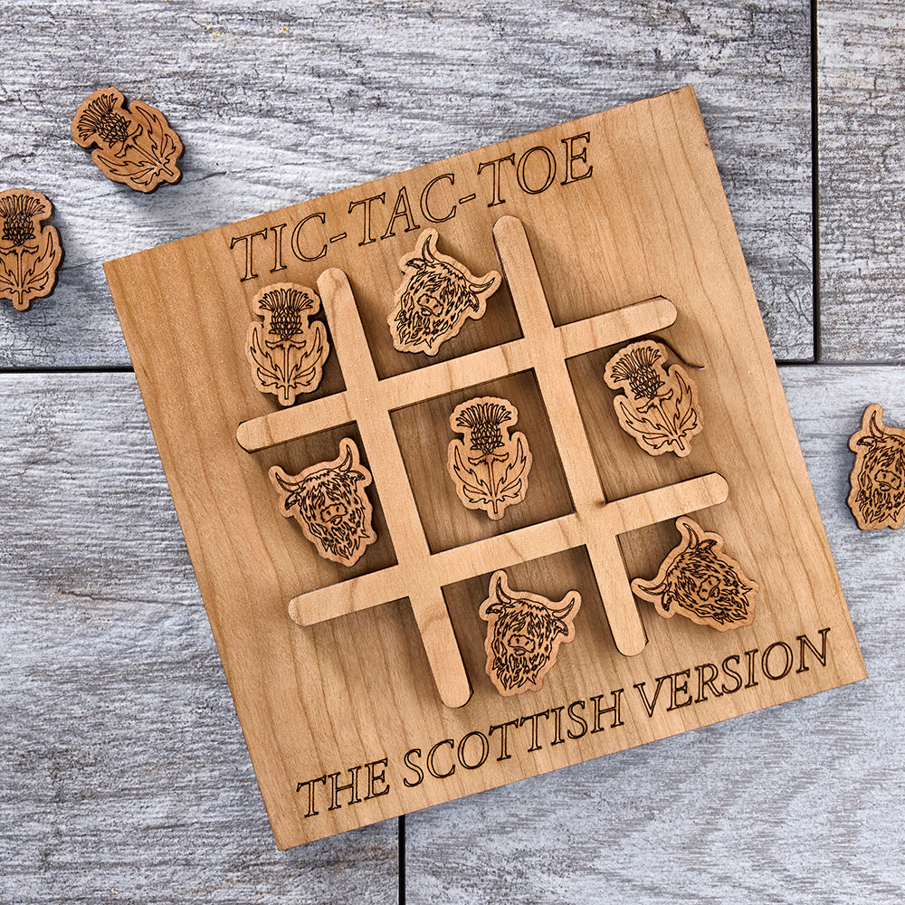 Wooden Scottish TicTacToe Game with cows and thistles instead of x's and o's