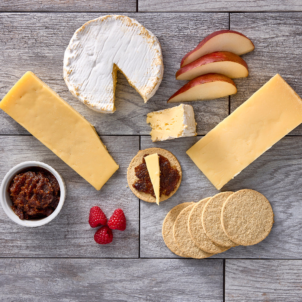 Scottish Cheese Course with three cheeses, oatcakes and fig chutney.